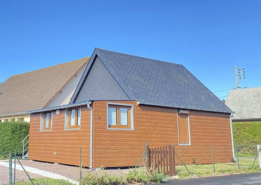 Chaleureux chalet en bord de mer Merville-Franceville-Plage Extérieur photo